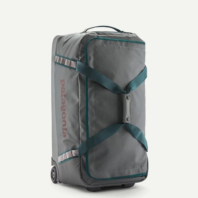 patagonia wheeled duffel sizes Black Hole 40 Liter Pollinator Orange The internal frame collapses for out Patagonia Black Hole Wheeled Duffel