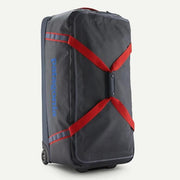 Patagonia Black Hole Wheeled Duffel 100l Smolder Blue w/Amanita Red